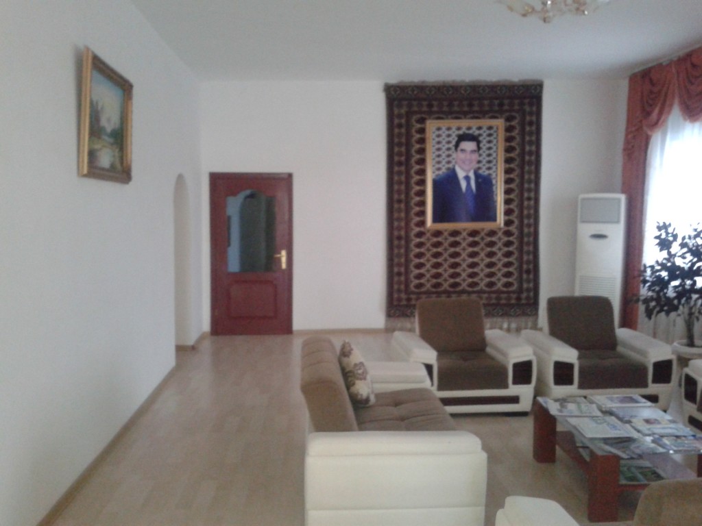 Lobby of the Uzboy hotel. The current president is omnipresent