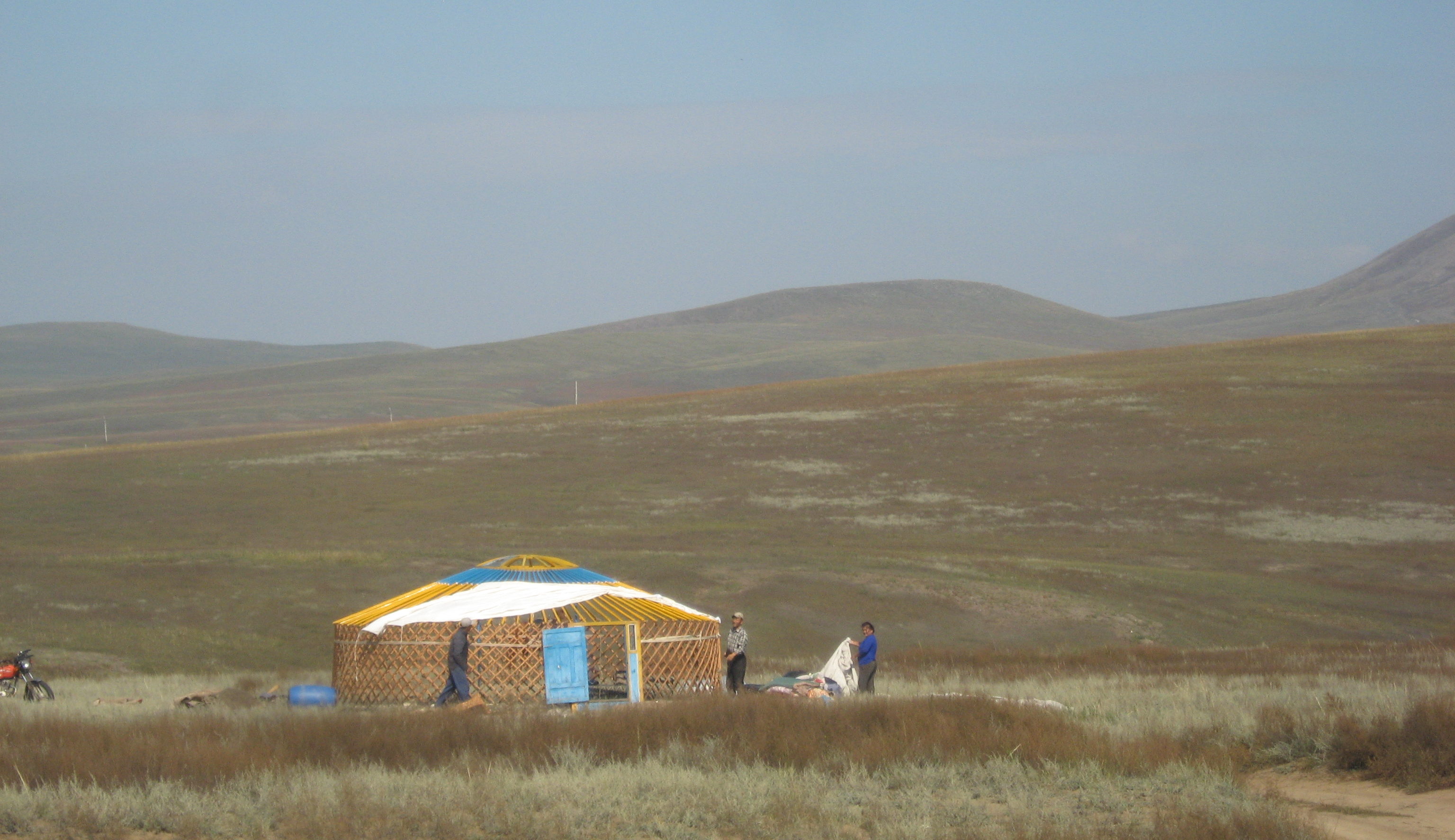 Mongols preparing for winter. The yurts gget disassembled